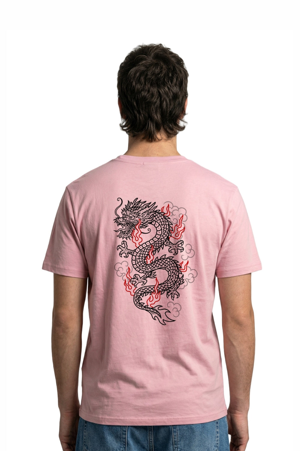 Person wearing a pink t-shirt with a dragon design on the back, standing against a white background