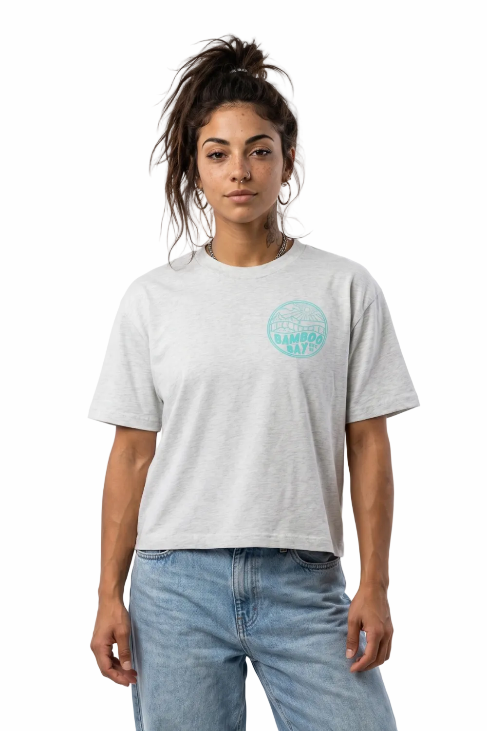 Person wearing a light gray t-shirt with a circular logo on a white background