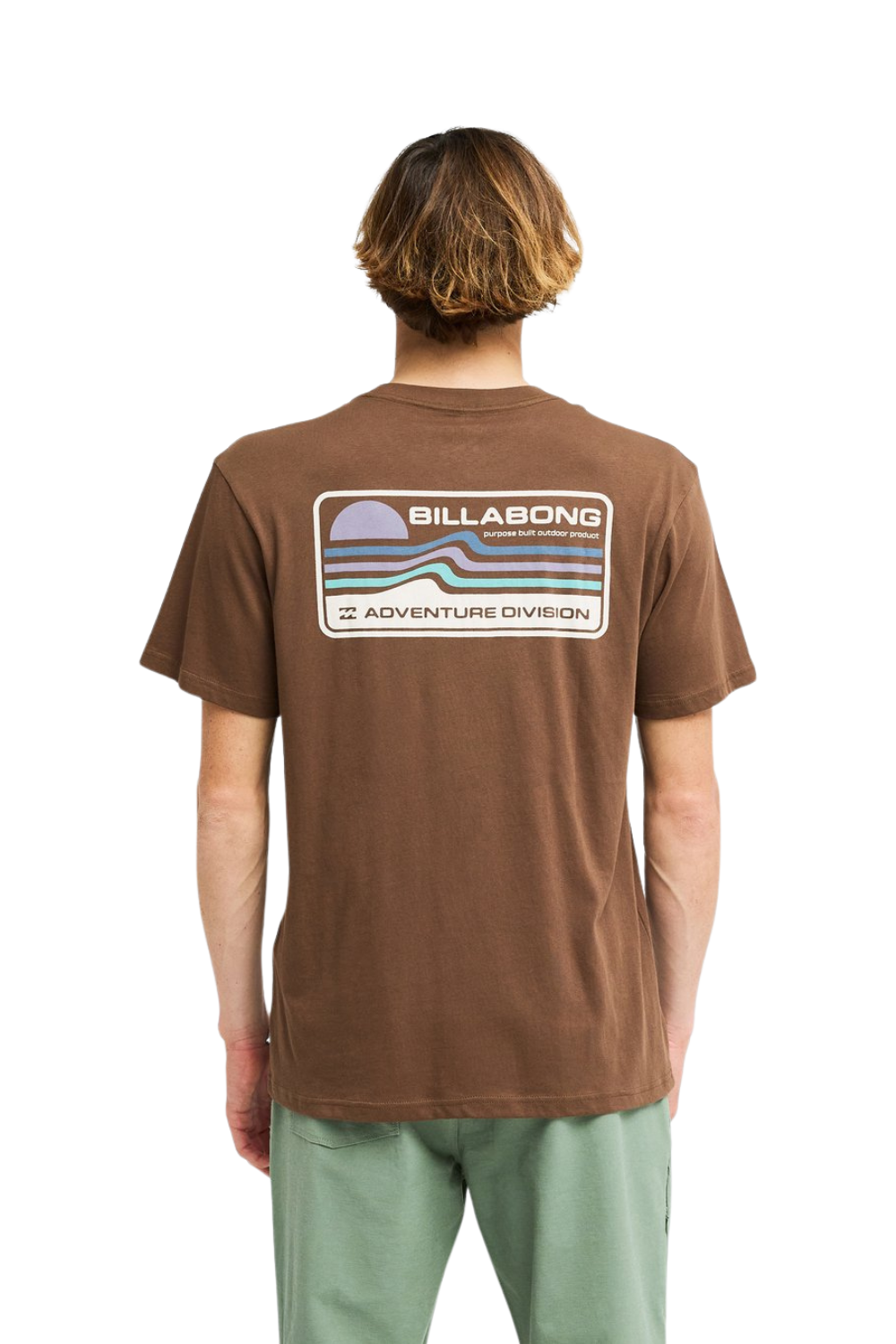 Man from behind wearing a brown T-shirt with a Billabong logo on the back.