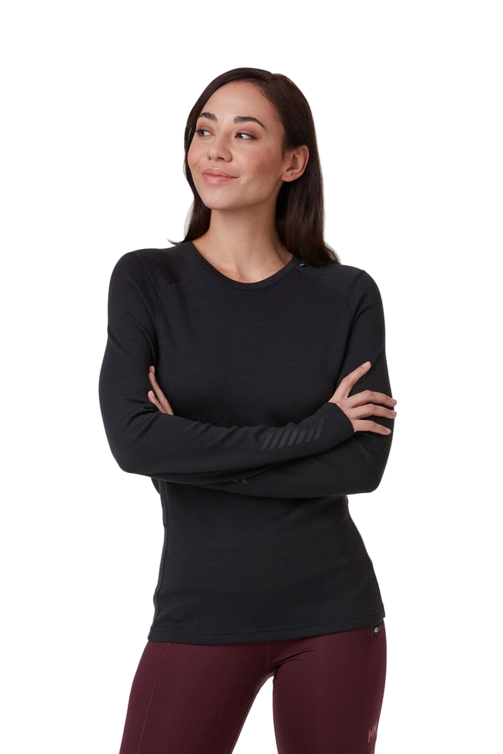 Woman wearing a black long-sleeve top with maroon pants on a white background