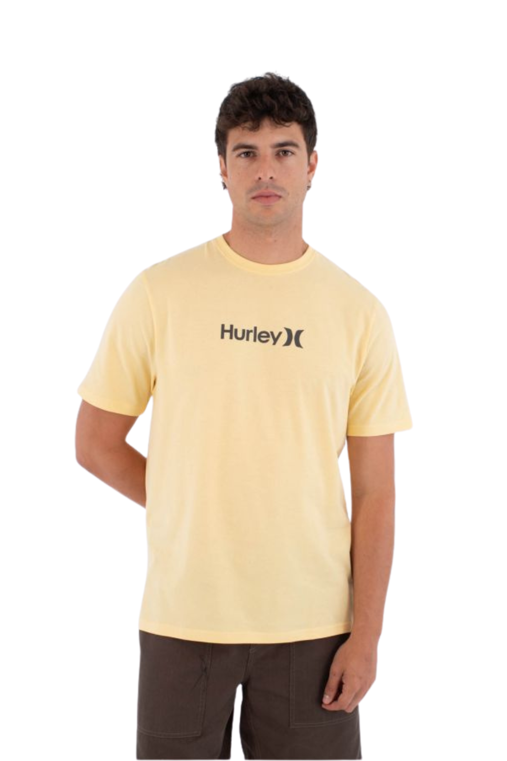 Man wearing a yellow Hurley t-shirt on a white background