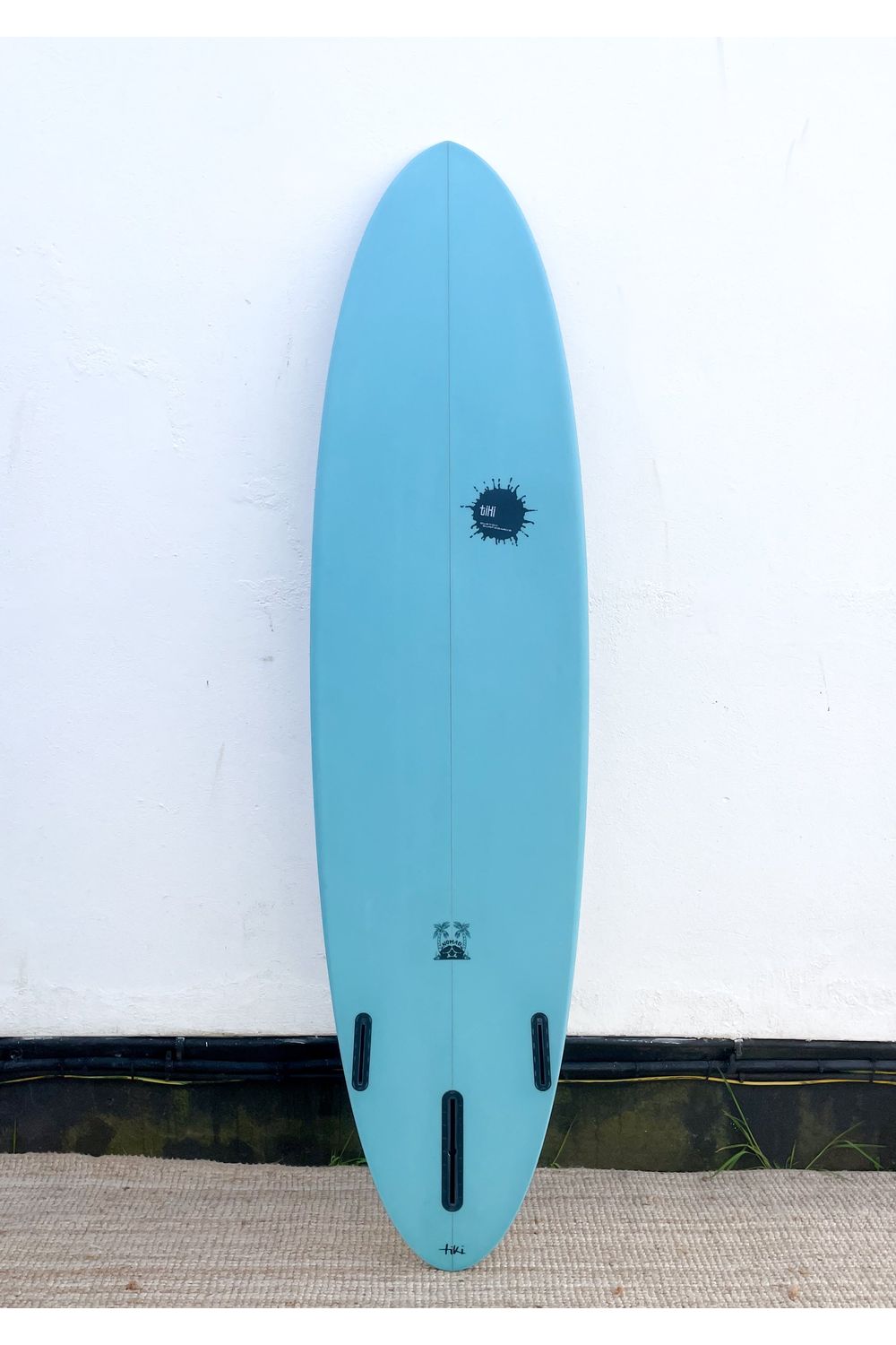 Image of Tiki Custom Surfboard - 7'2 Nomad Mid - Iced Aqua from the front