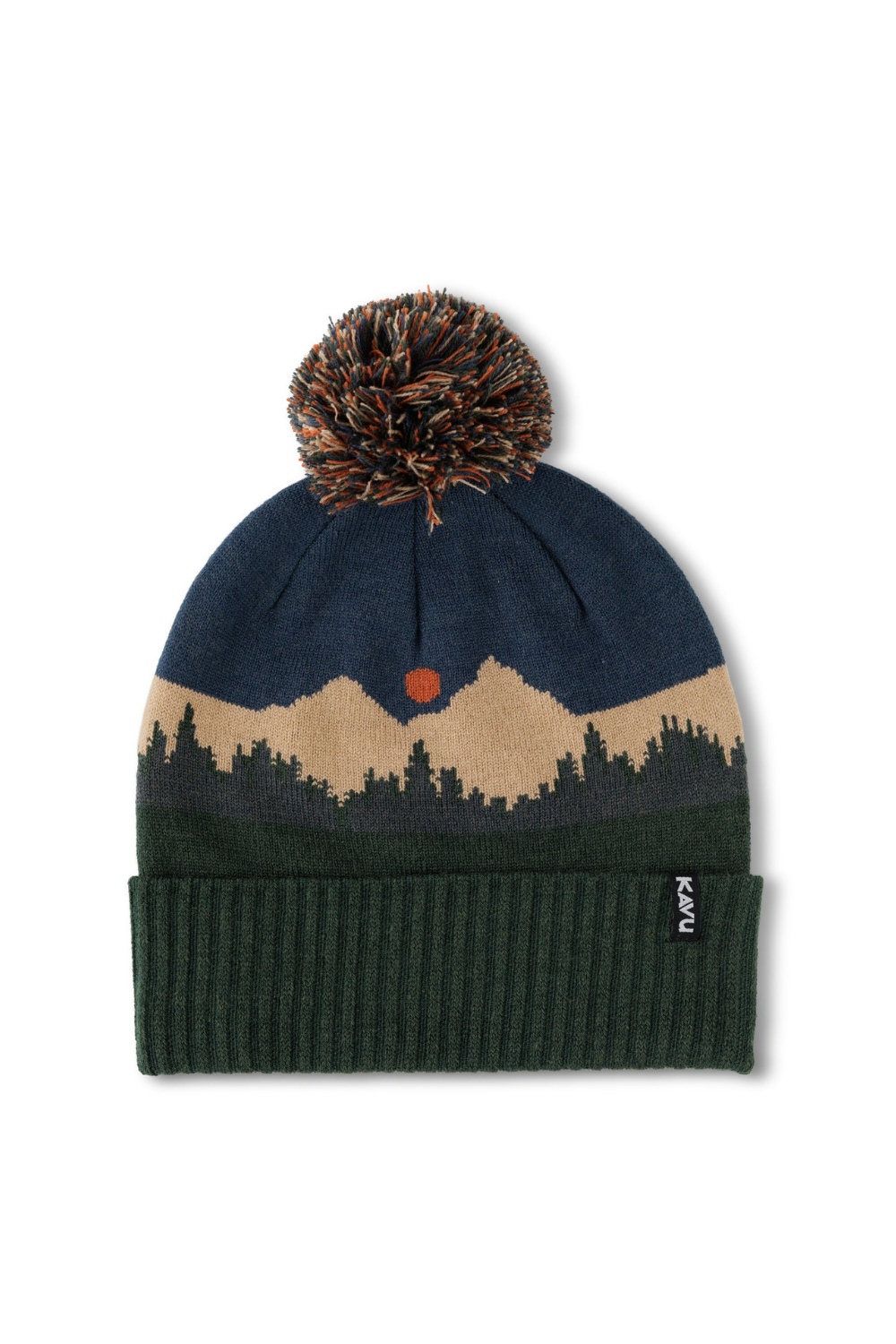 A knit beanie hat with a dark navy blue top, a tan and dark green mountain and pine tree pattern with a small orange sun, and a dark green ribbed cuff. It has a brown and navy pom-pom on top.