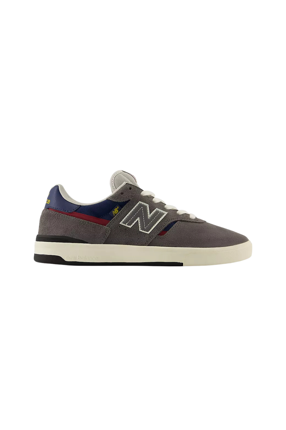 A New Blance snearker in dark grey, navy and ddark red with a white sole