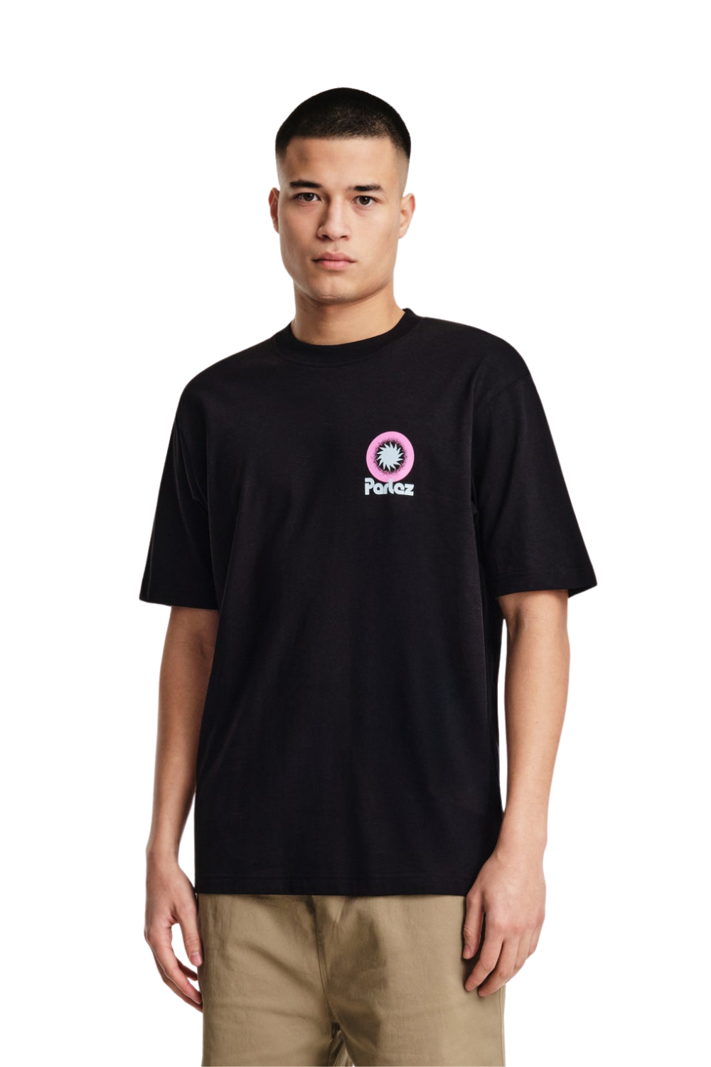 Person wearing a black T-shirt with a pink Parlez logo