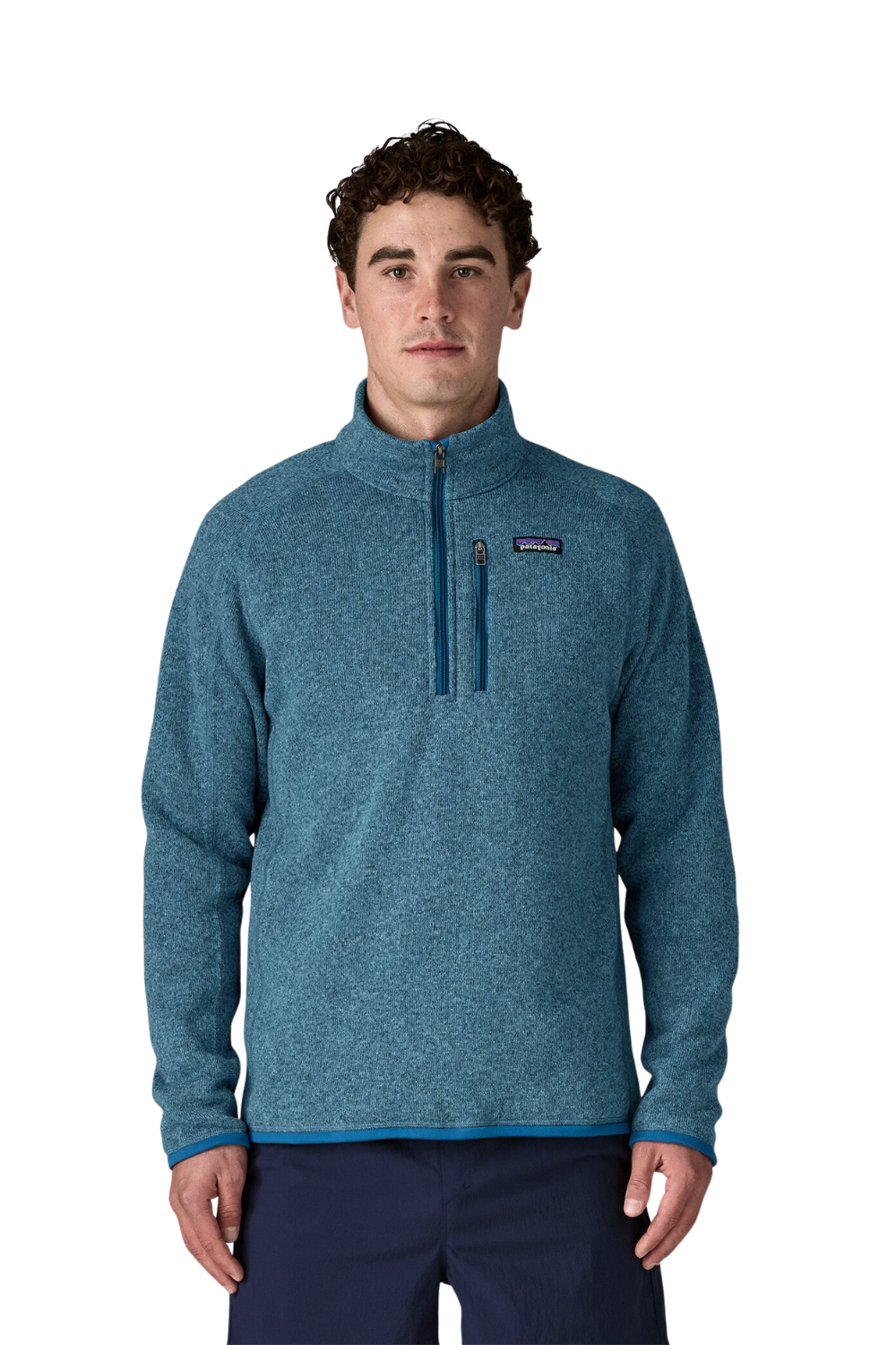 Man wearing a blue fleece pullover with a visible brand logo on a white background