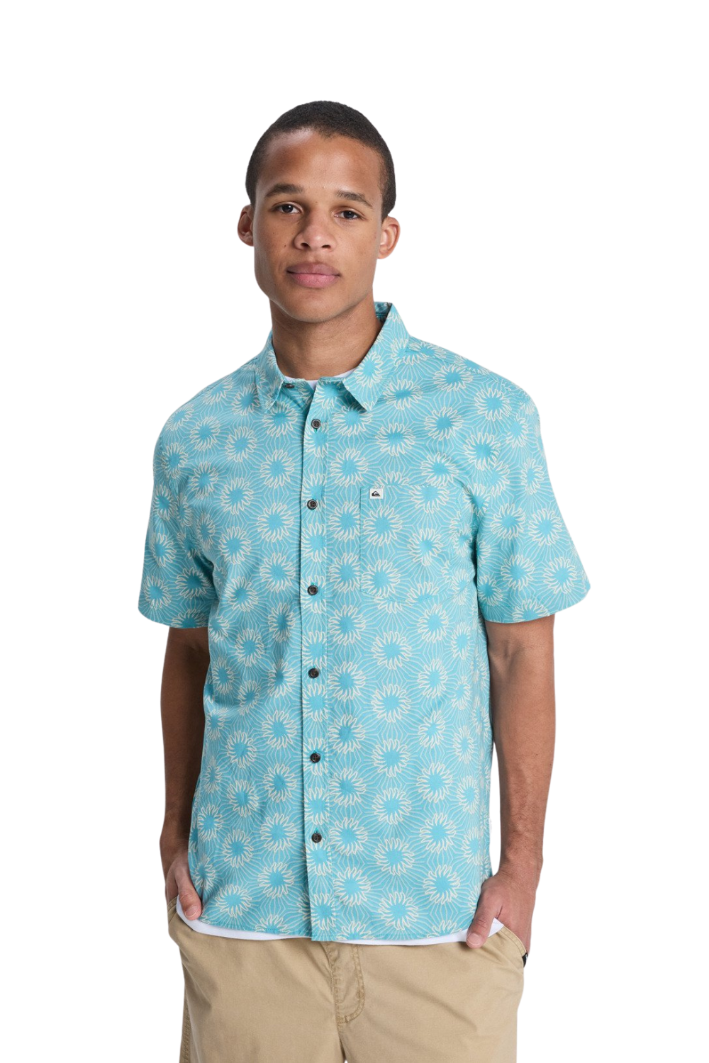 Man wearing a blue patterned shirt on a white background