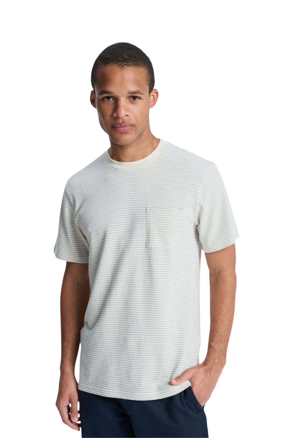 Man wearing a white striped t-shirt on a white background