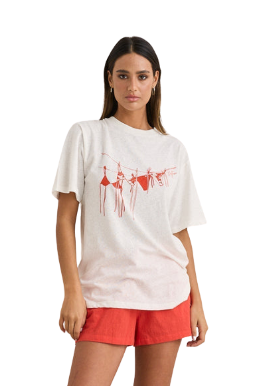 Woman wearing a white t-shirt with red graphics and red shorts on a white background