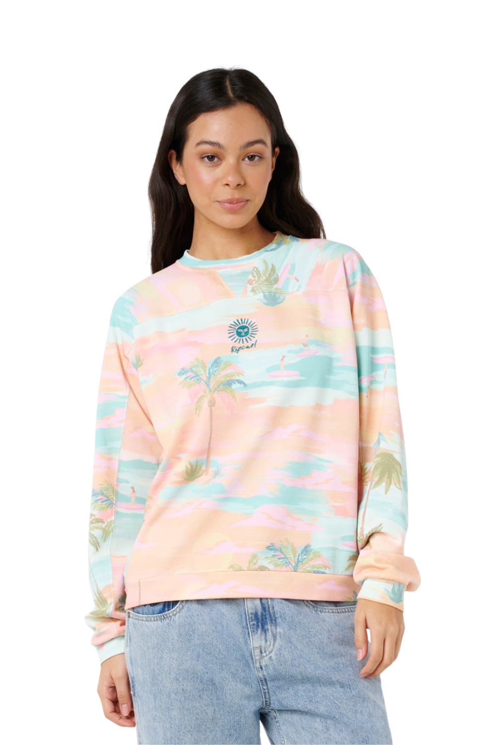 Woman wearing a colorful floral sweatshirt with a white background