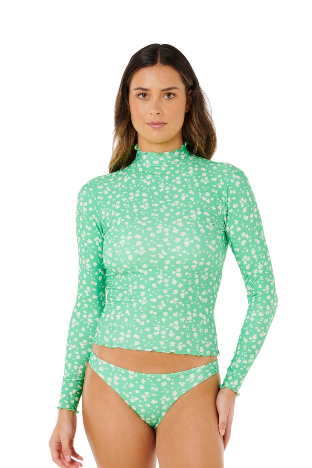 Person wearing a long sleeve rashguard in light green and white floral allover print pattern