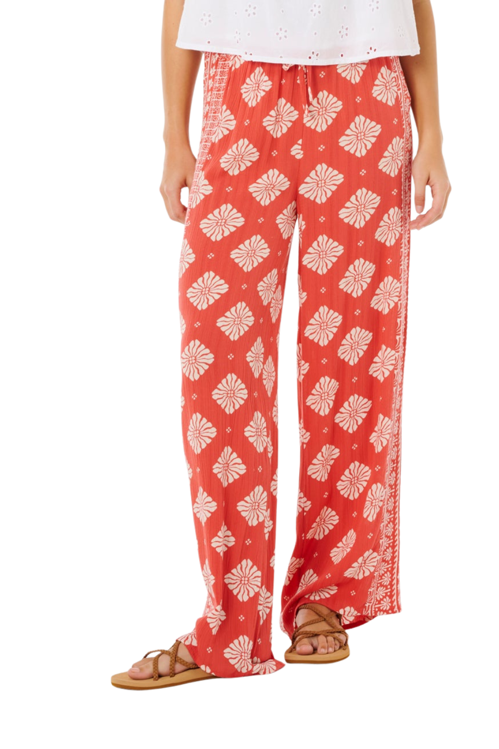 Wide trousers in red with a white floral pattern from Rip Curl