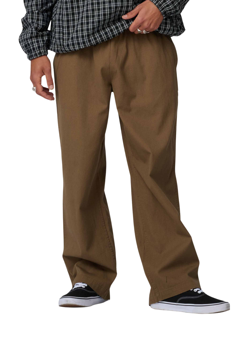 Brown pants worn by a person on a white background