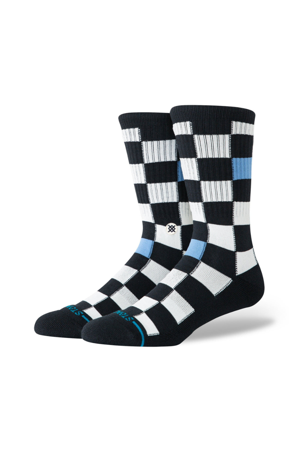 Pair of checkered socks with black, white, and blue pattern on a white background