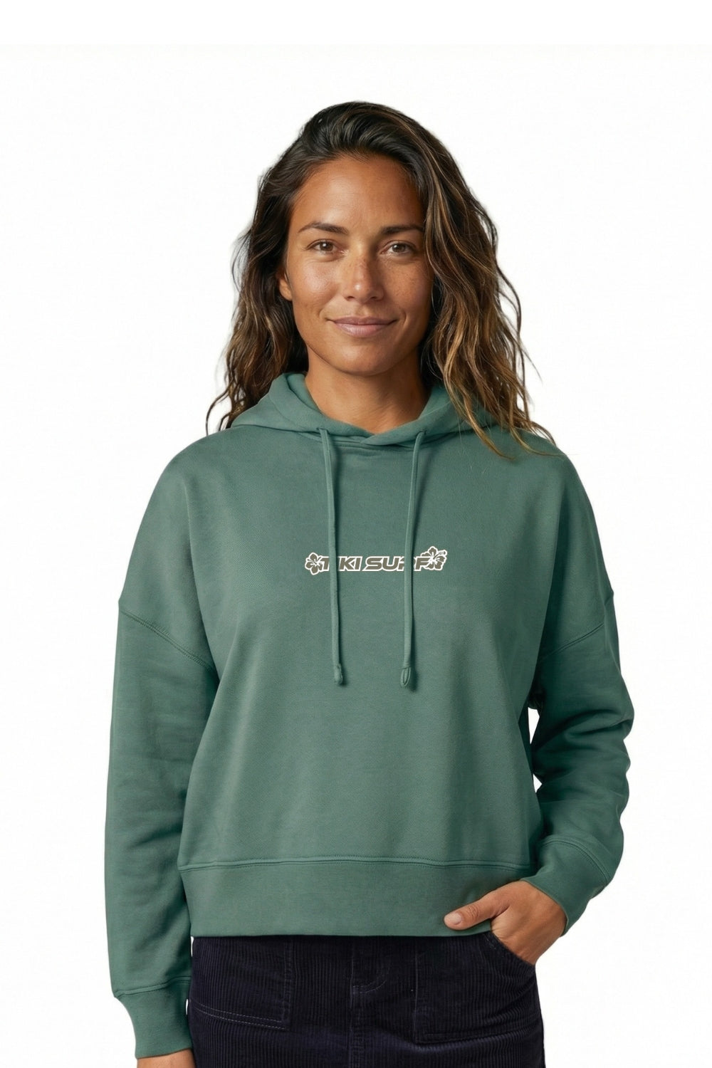 Woman wearing a green hoodie with a logo on a white background