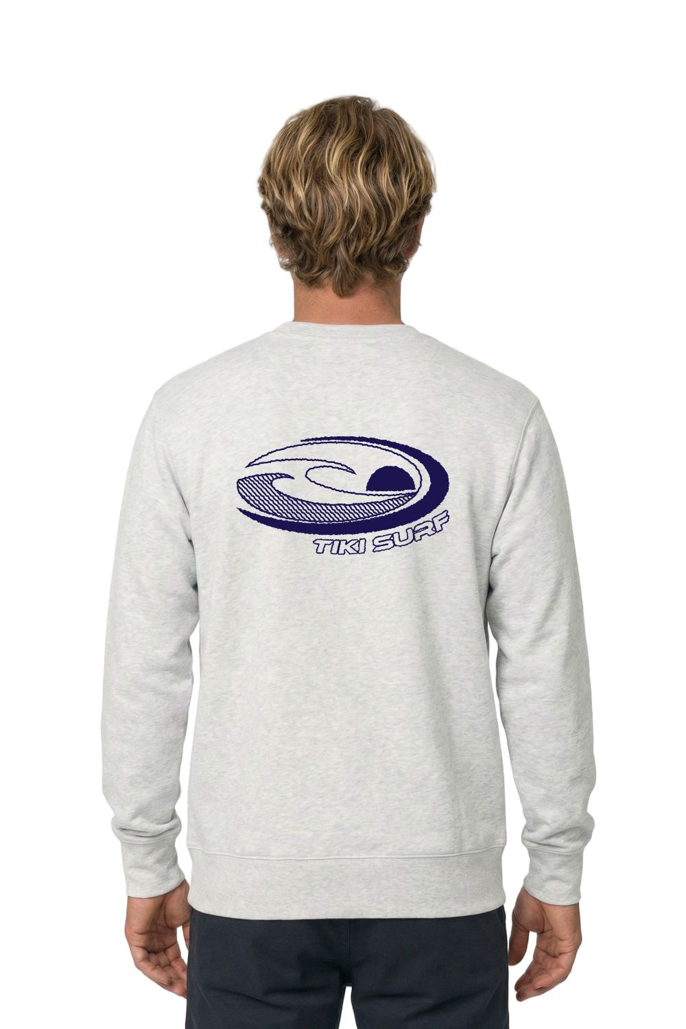 Person wearing a gray sweatshirt with a blue and white logo on the back, standing against a white background.