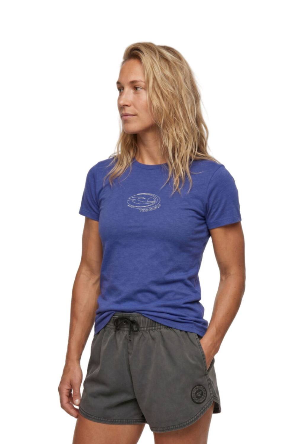 Woman wearing a blue t-shirt and gray shorts on a white background