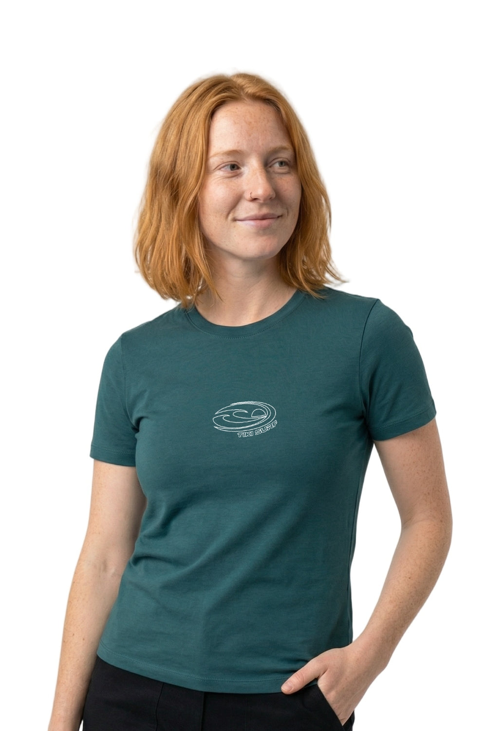 Person wearing a teal t-shirt with a logo on a white background