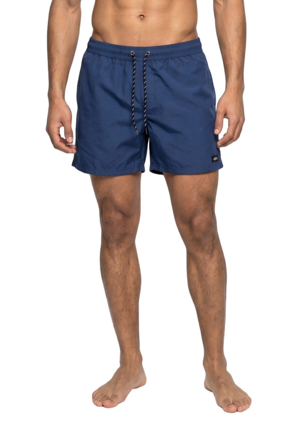 Person wearing blue swim shorts on a white background