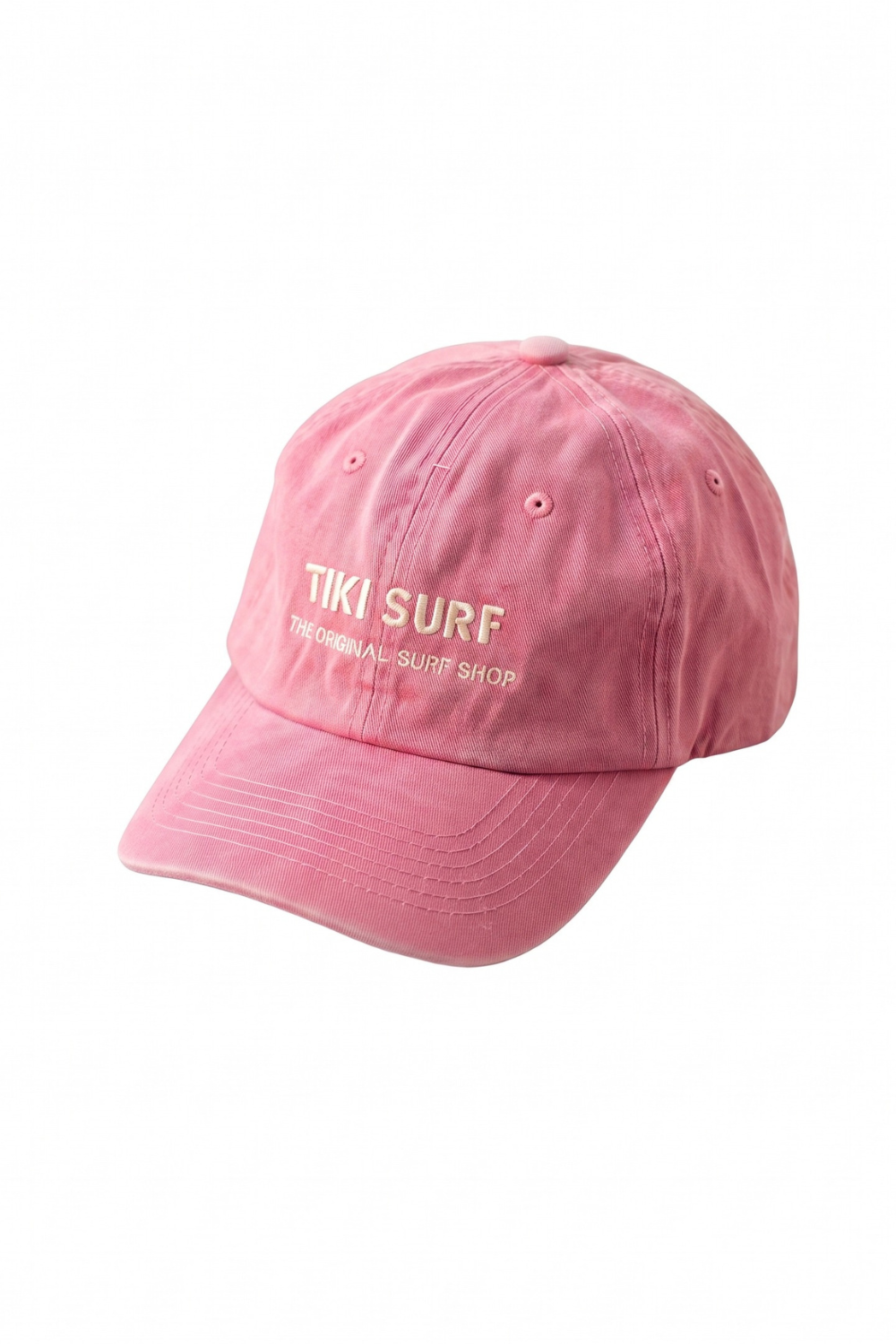 A pink cotton baseball cap with 'TIKI SURF' embroidered in white on the front, set against a plain white background.
