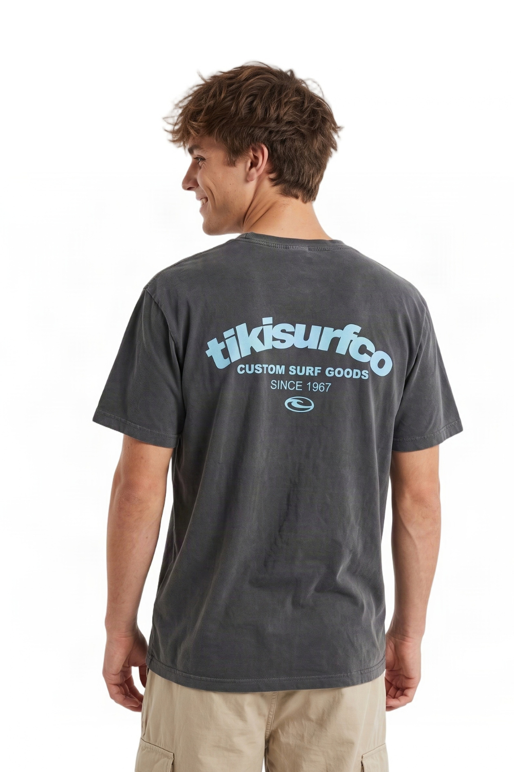 A man wearing a faded dark gray t-shirt with a light blue 'tikisurfco' logo on the back, shown from behind against a white background.