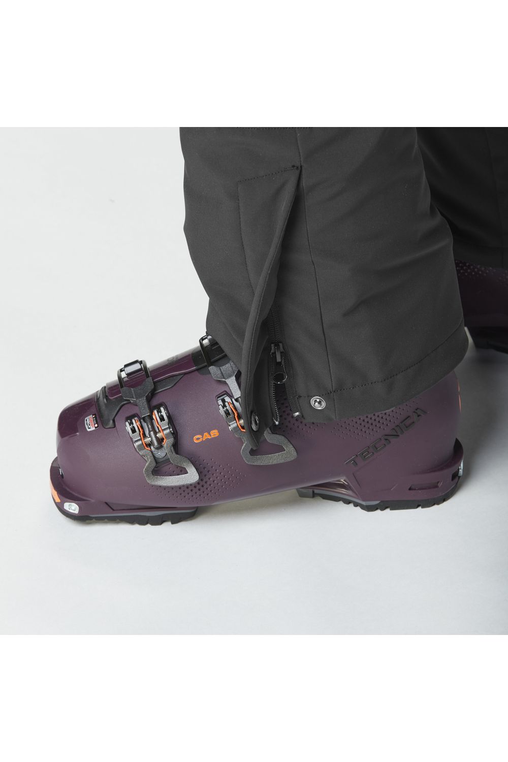 Picture Eyeri Bib Snow Pants Black view of lower hem popper