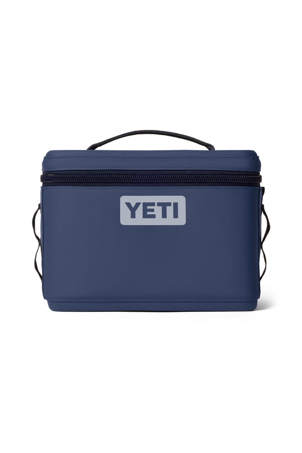 A navy blue YETI cooler bag with a top handle, black zipper, and a white YETI logo patch on the front, set against a plain white background.