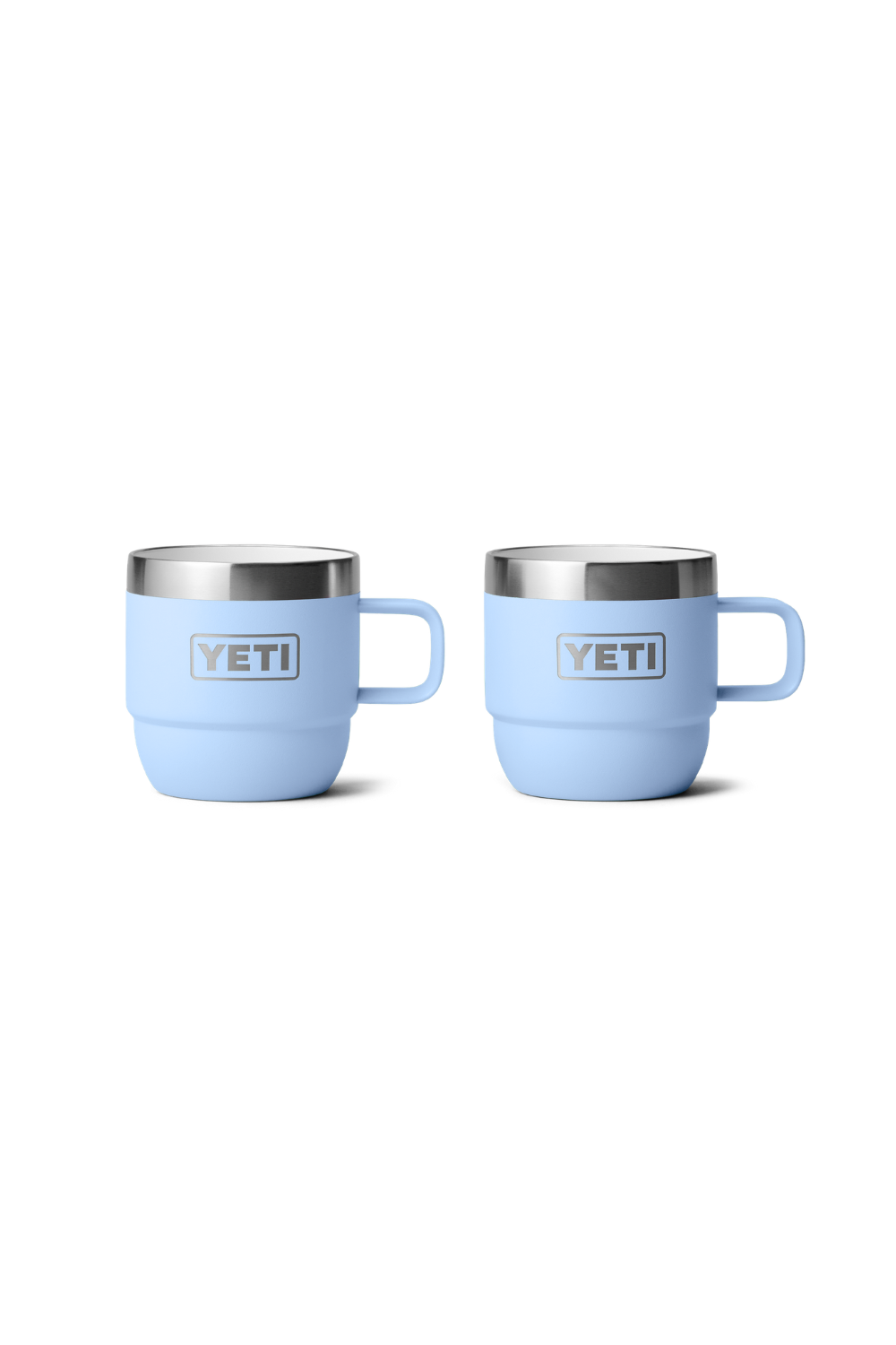 Two light blue Yeti espresso cups on a white background