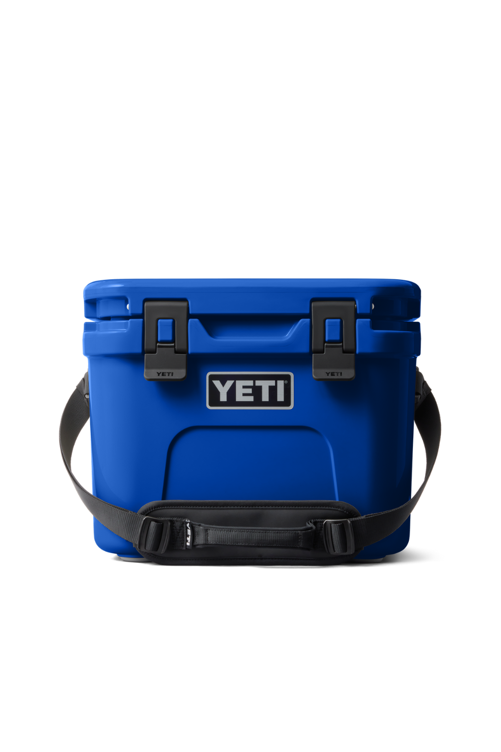 A blue YETI cooler with a black carrying strap and black latches, shown against a plain white background.