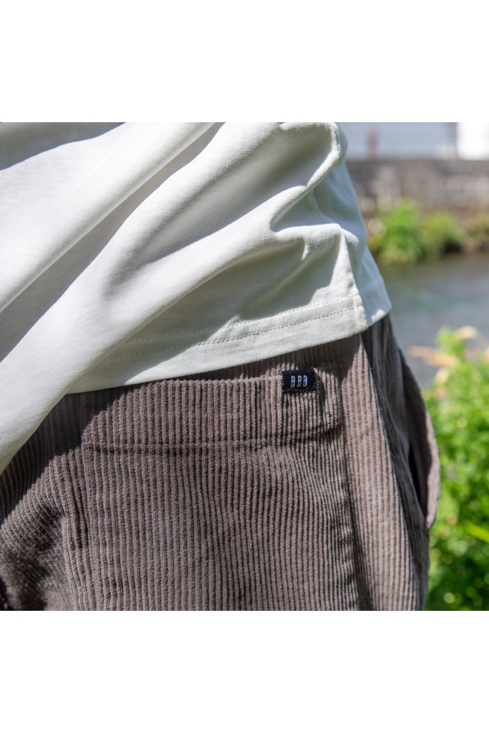 Bamboobay grey cord shorts back pocket and logo