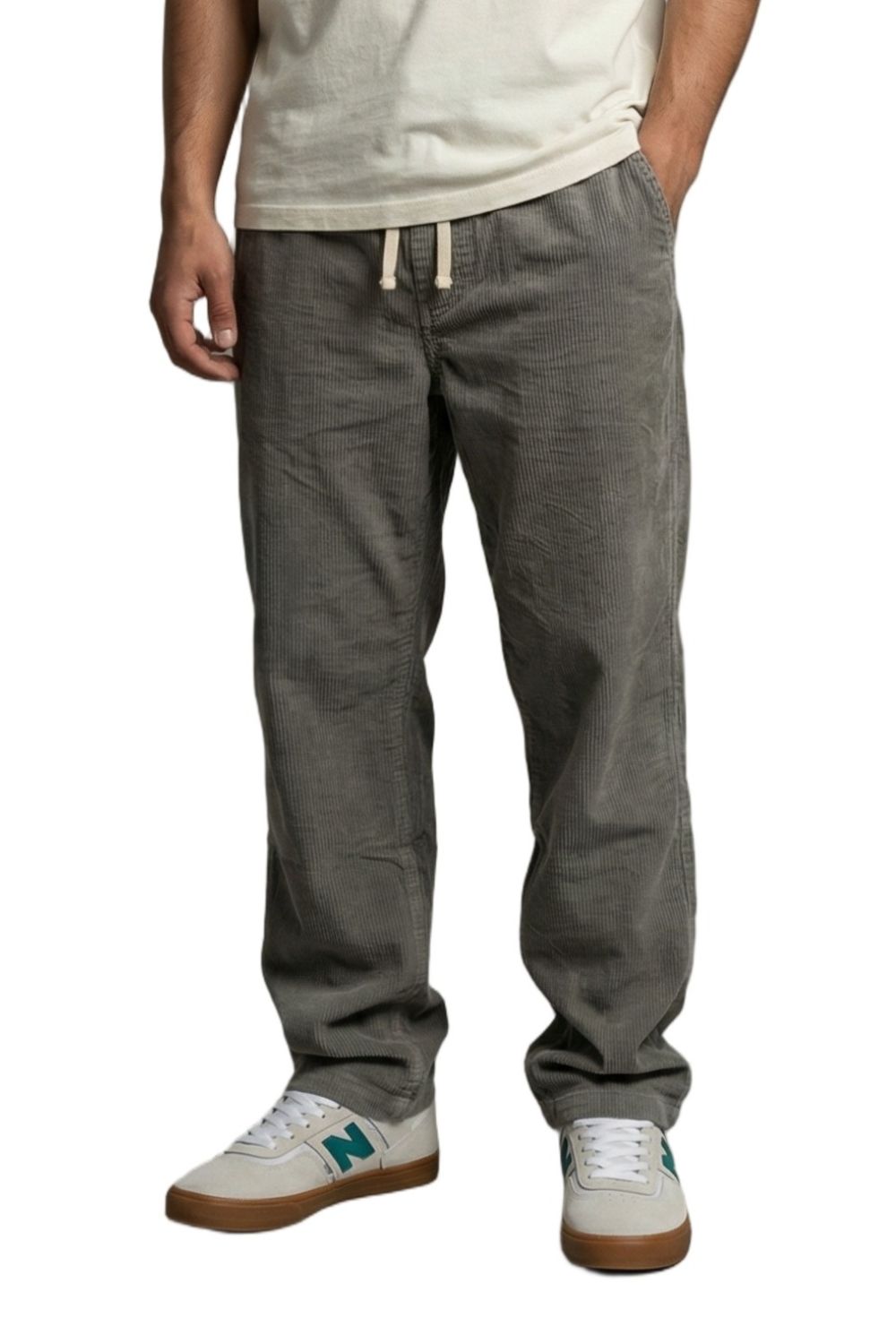 Person wearing a pair of BamBooBay corduroy trousers in grey