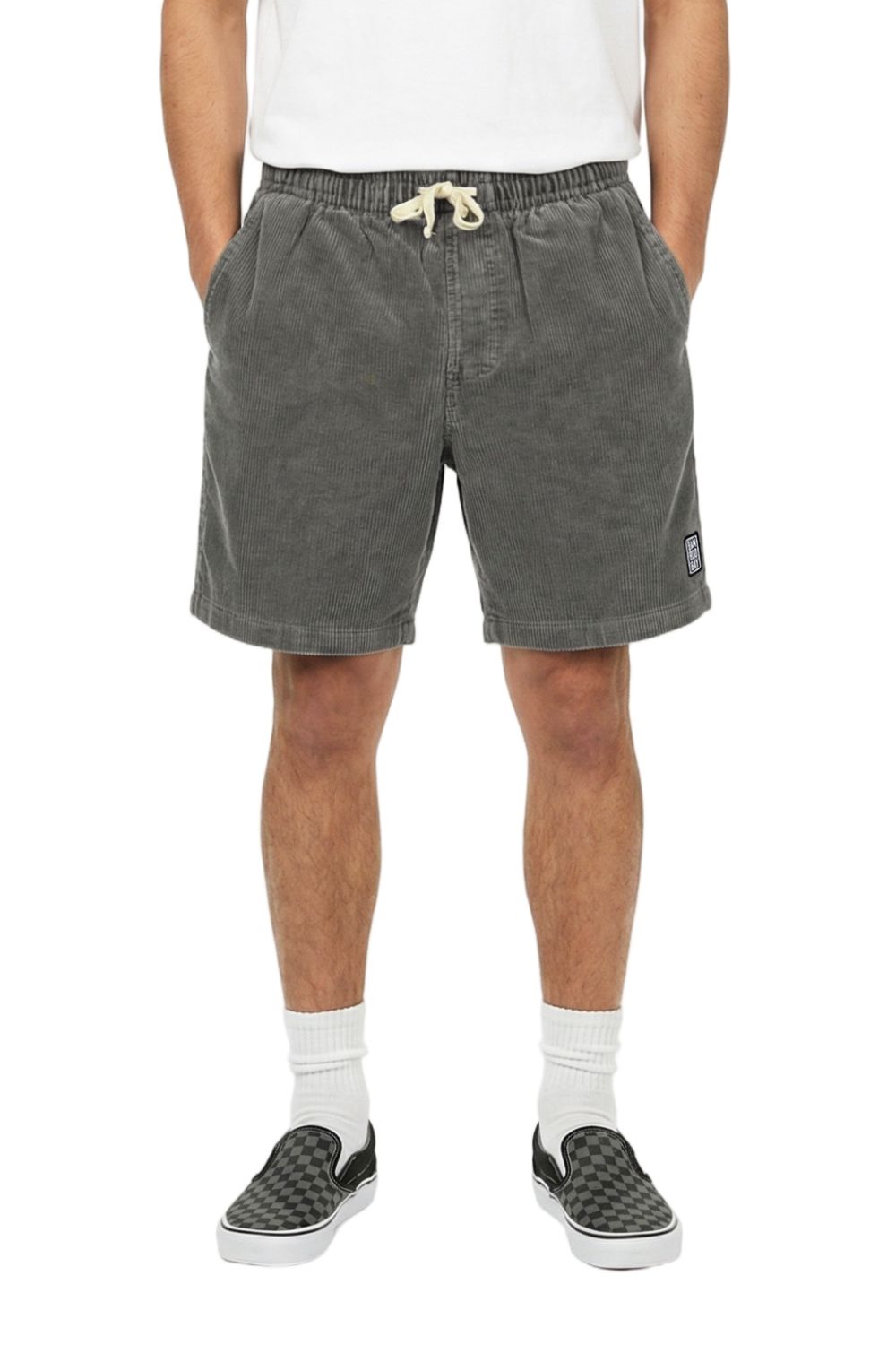 Person wearing gray shorts with a drawstring on a white background
