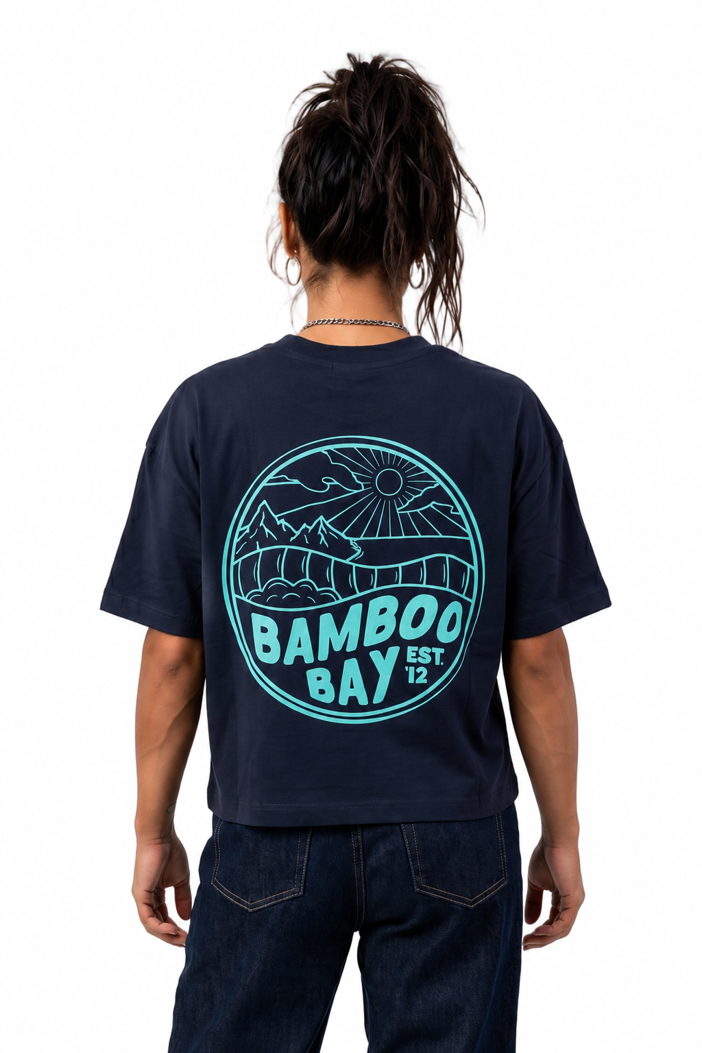 Woman wearing a navy t-shirt with a turquoise BamBooBay graphic print on the back