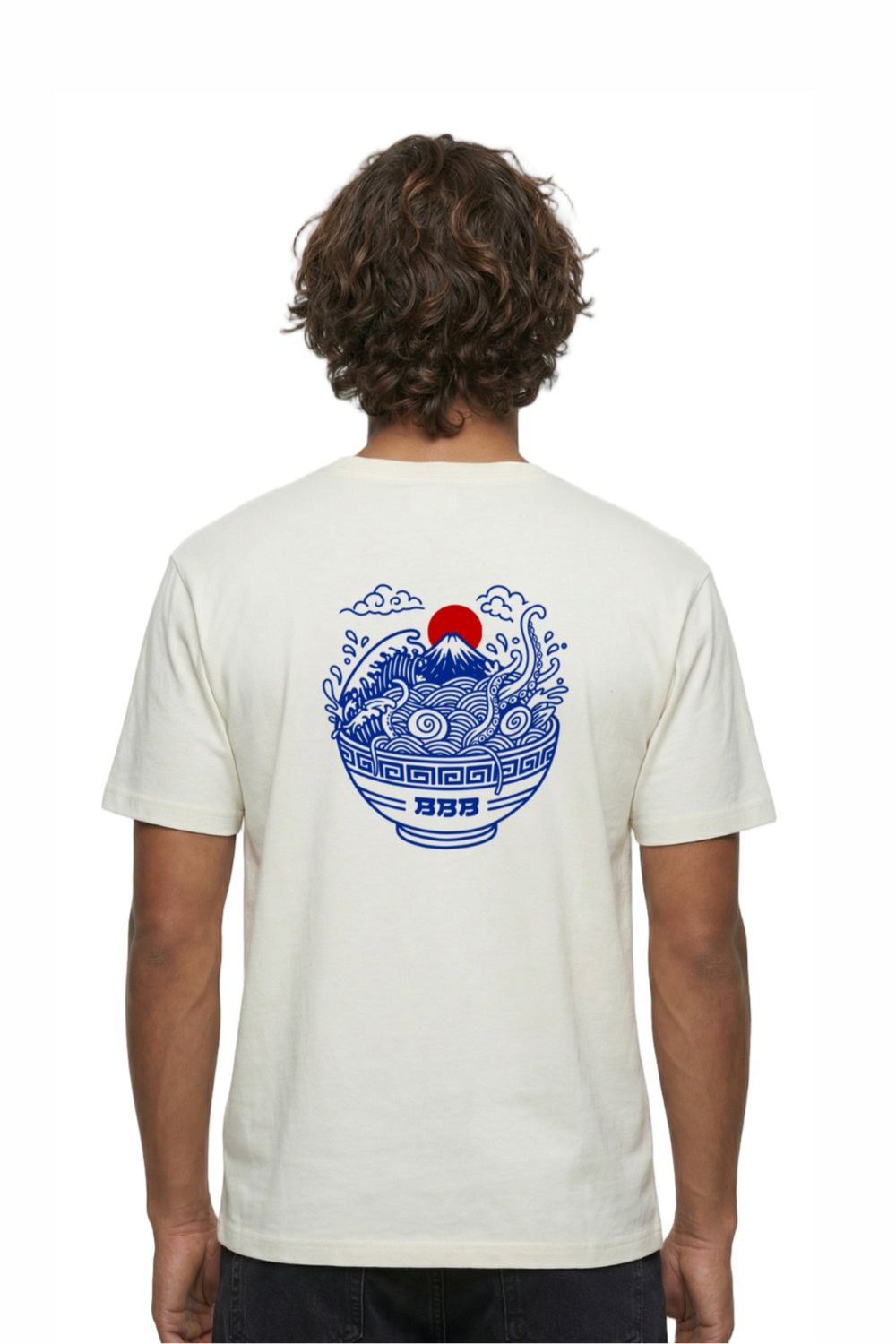Person wearing a white t-shirt with a blue and red graphic on the back