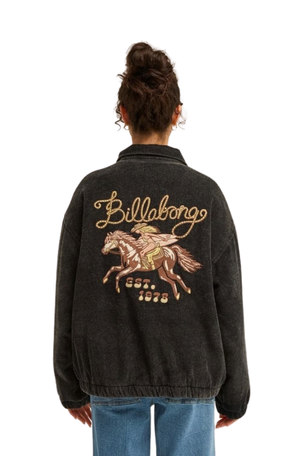 A person shown from the back wearing a dark charcoal Billabong jacket with a large embroidered cowboy and horse graphic on the back, paired with blue jeans against a plain white background.