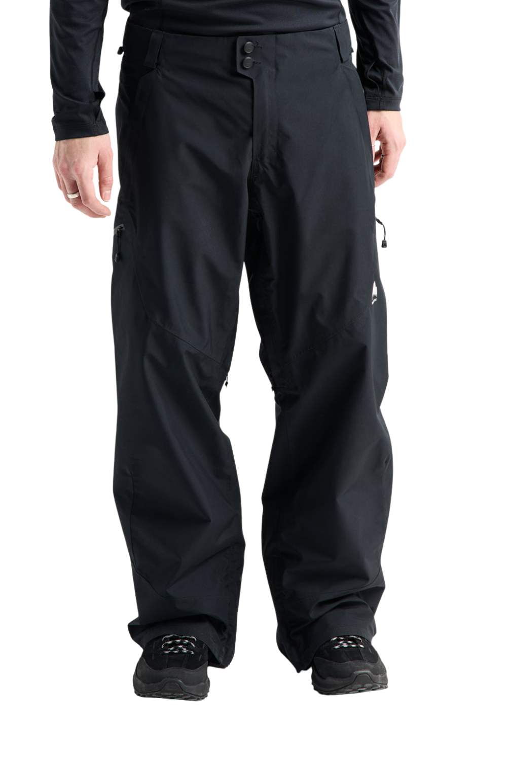 Black snowboard pants worn by a model, shown from the waist down on a white background.