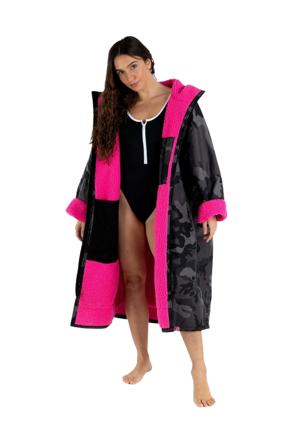 Person wearing a black camoflauge and pink dryrobe