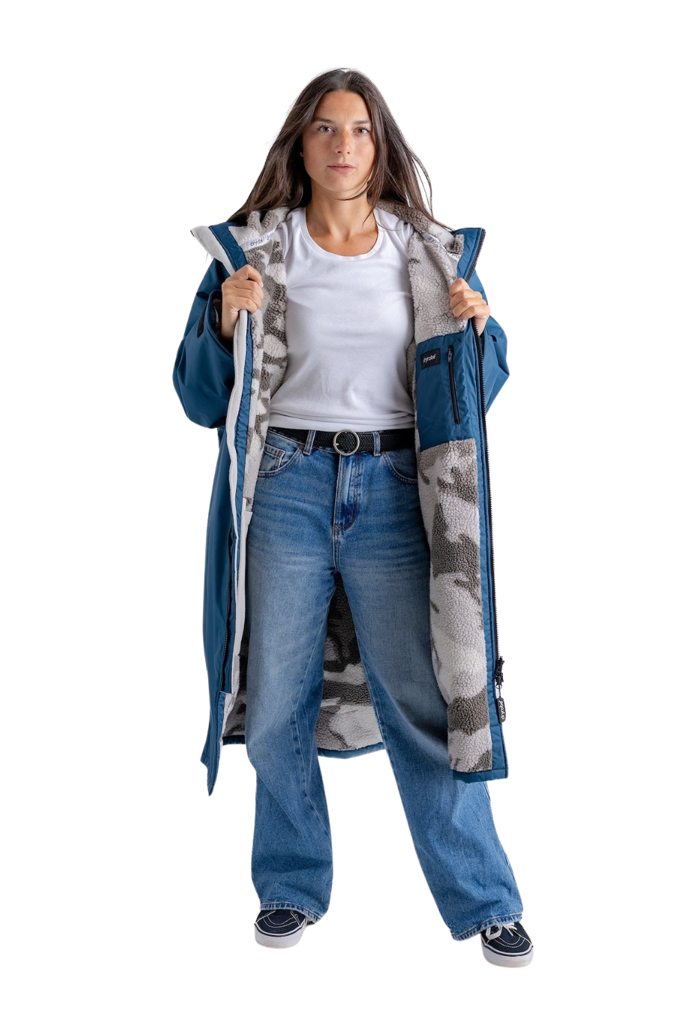 A model wearing a mid blue Dryrobe with a sand camoflage lining.