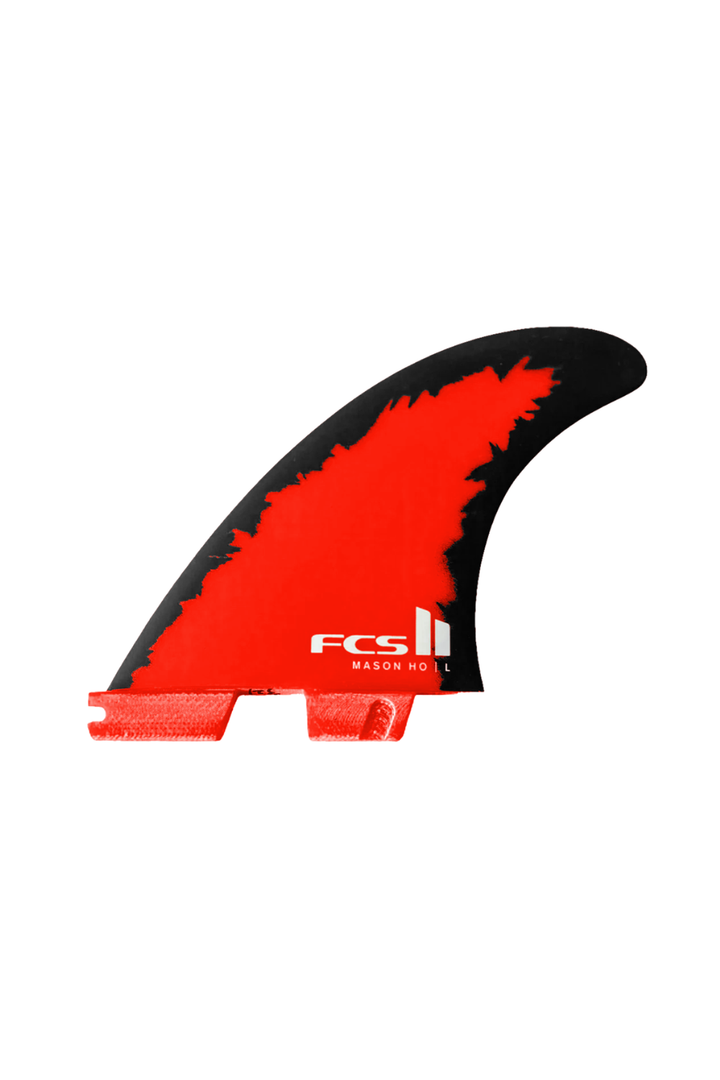 Red and black surfboard fin with FCS logo on a white background