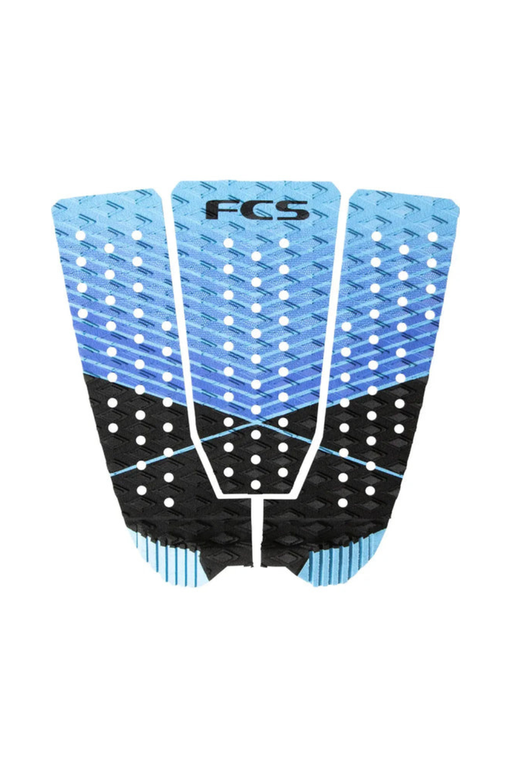 FCS surfboard tail pad with blue and black design on a white background