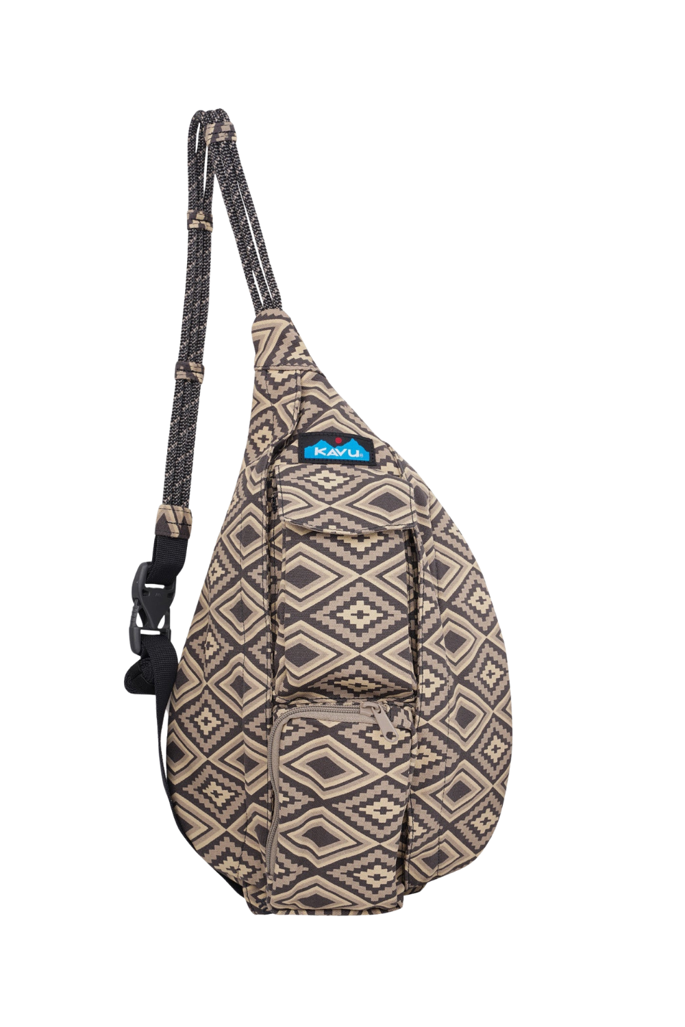 A KAVU Sling bag with a geometric Southwestern pattern in beige and brown, featuring a black adjustable woven strap and a blue KAVU brand label.