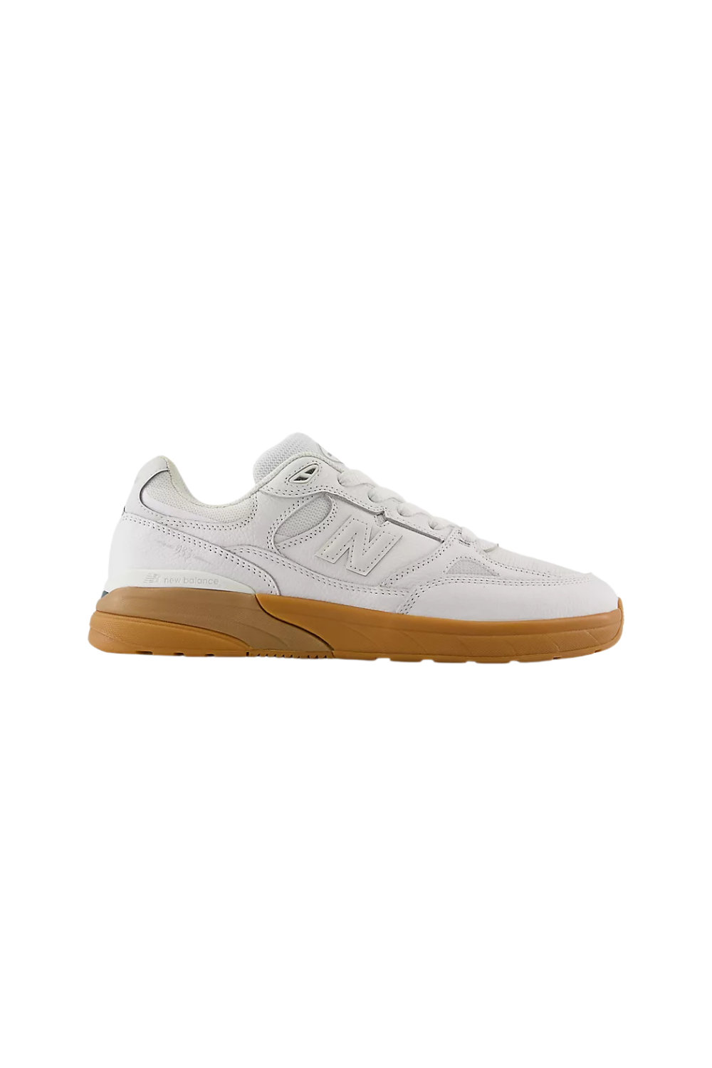 White New Balance sneaker with rubber sole on a white background