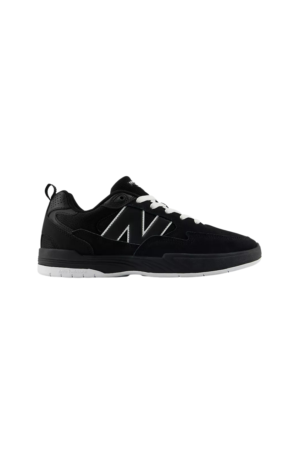 Black New Balance sneaker with white details on a white background