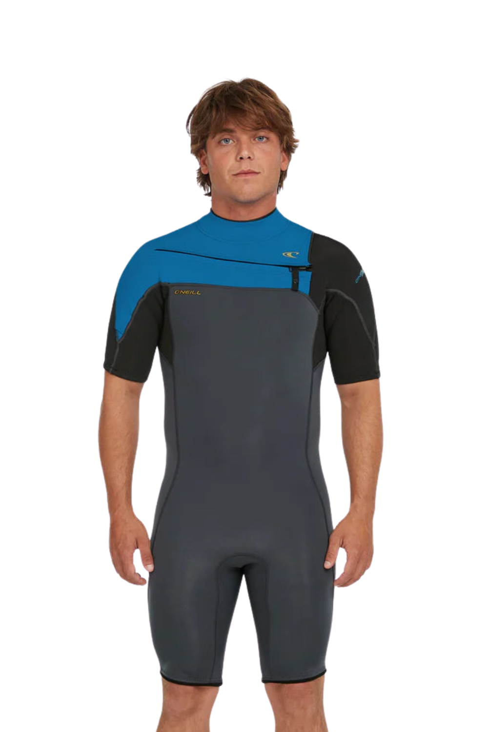 A man wearing a short-sleeve wetsuit in dark gray, black, and bright blue, standing against a plain white background.