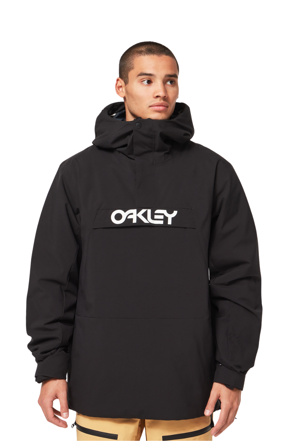 A man wearing a black Oakley Snowboarding anorak with a white Oakley logo on the chest.