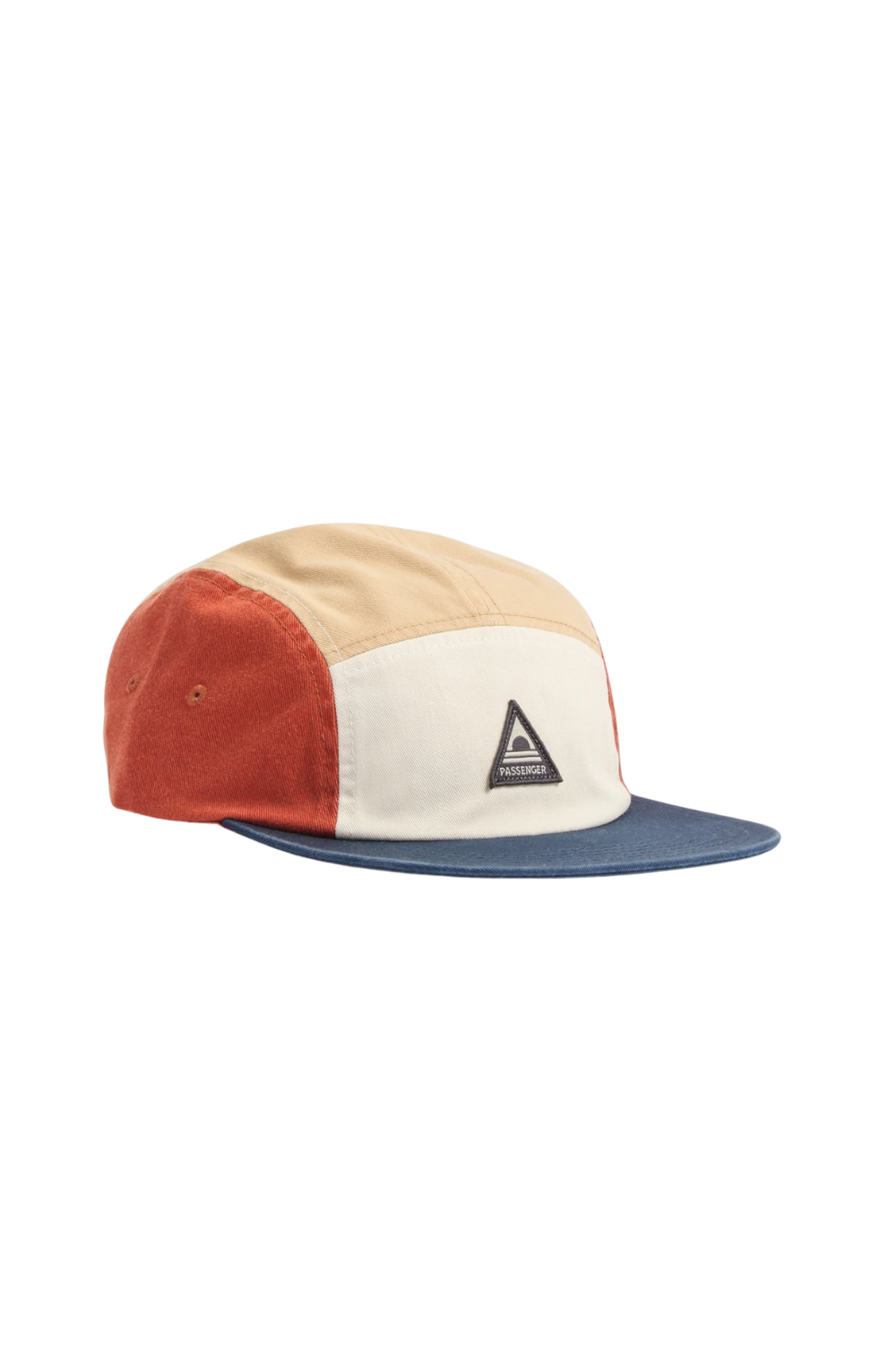 A color-blocked 5-panel camp cap with a beige crown, a rust-orange side panel, an off-white front panel, and a navy blue flat brim. A small black triangular logo patch is stitched on the front panel.