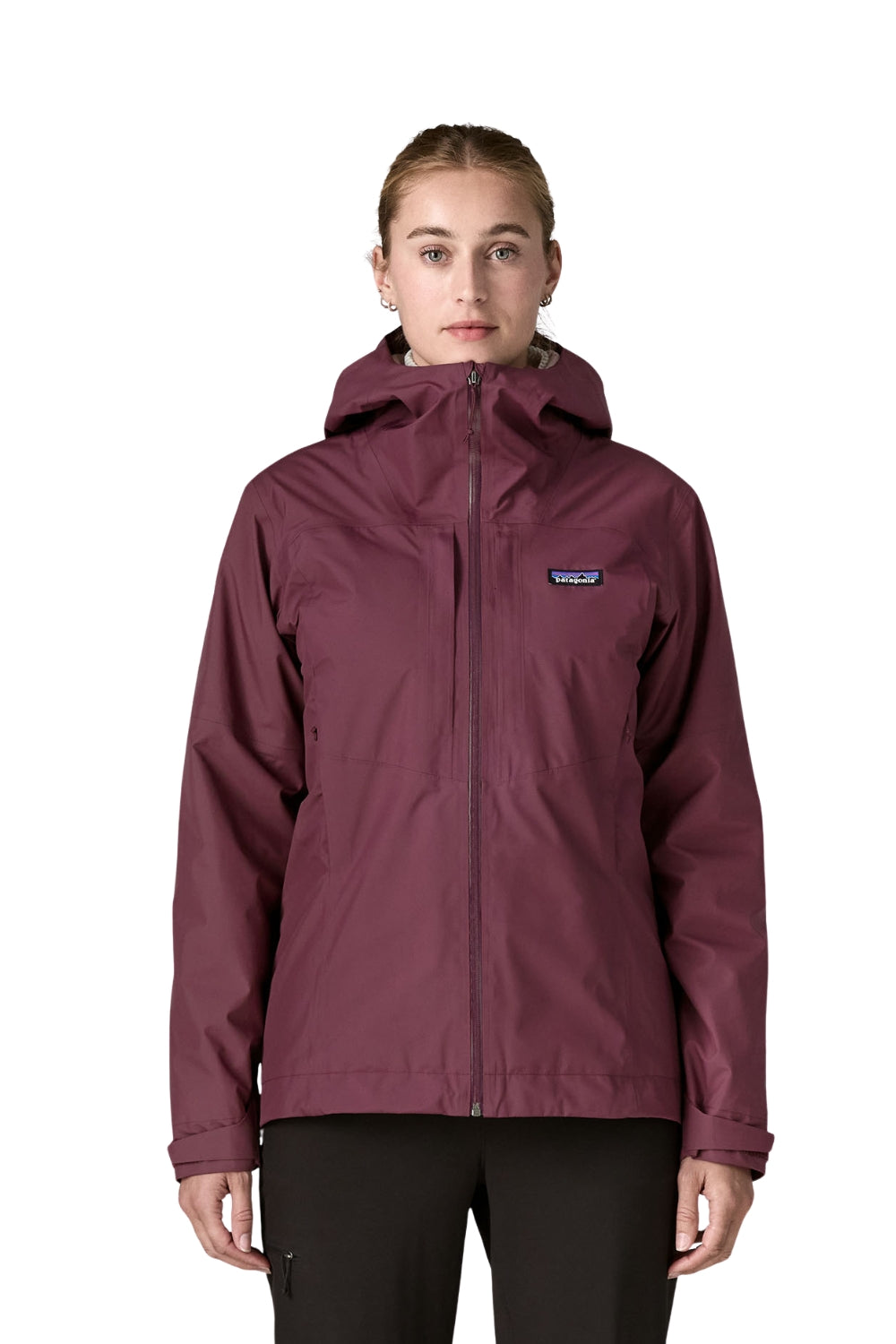 A woman modeling a Patagonia hooded jacket in a deep burgundy color, featuring a full-zip front and the brand logo on the left chest, set against a plain white background.
