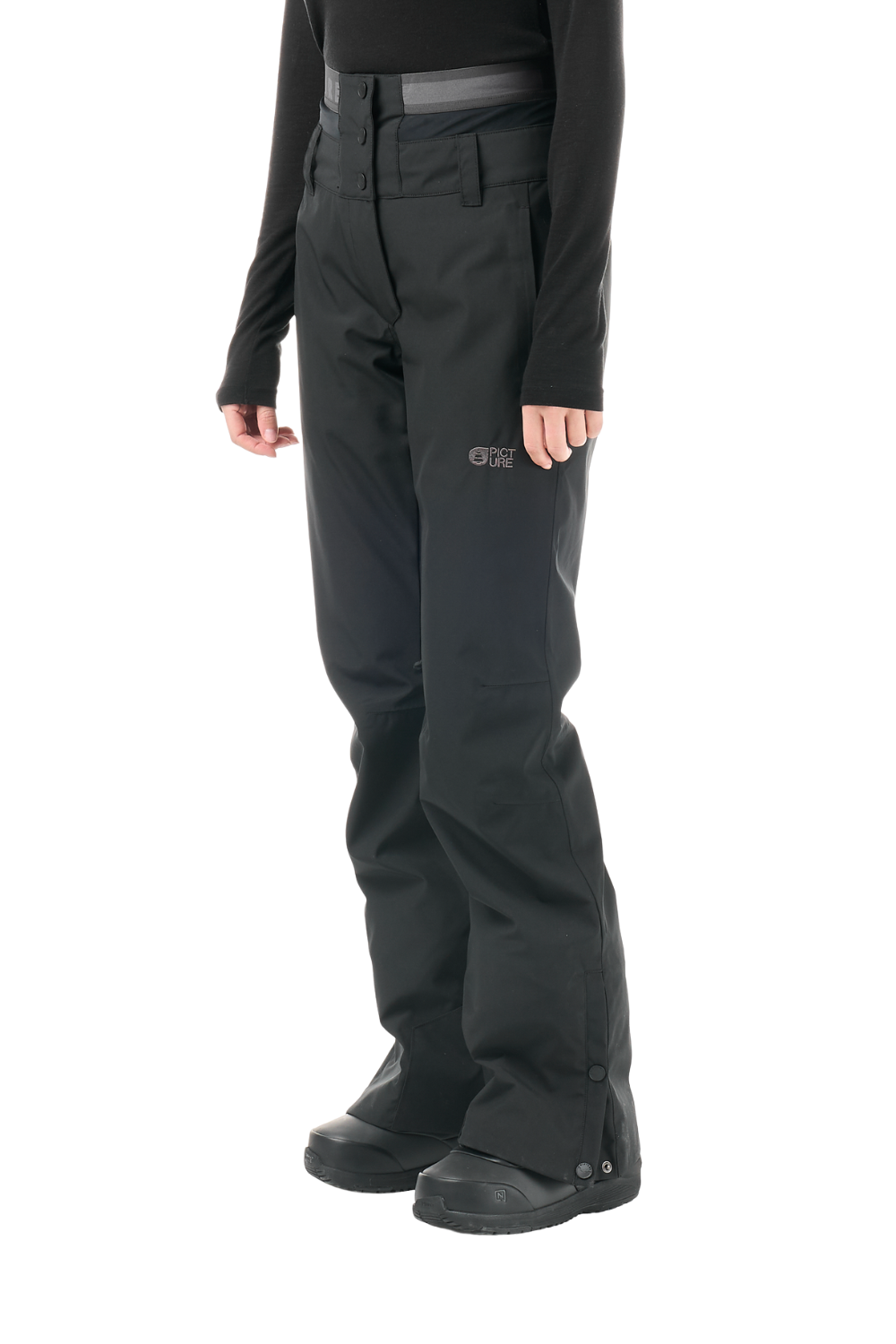 Black snow pants with a small white G-1000 logo on the left thigh, shown on a model wearing a black long-sleeve top and black boots against a white background.