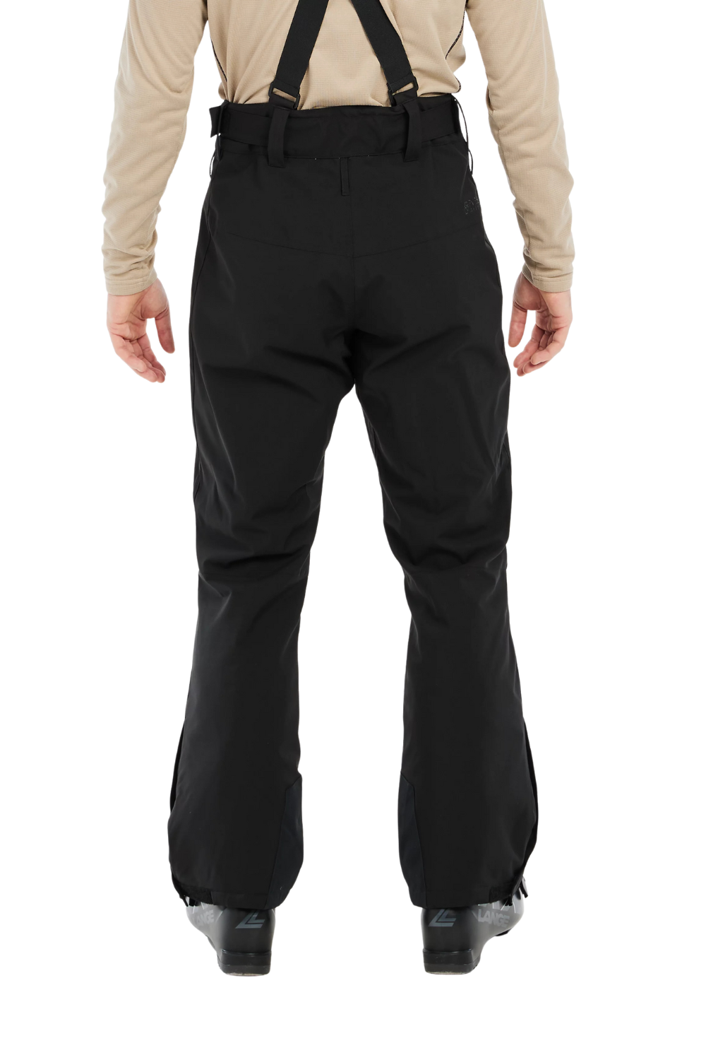 Person wearing black snow pants with suspenders on a white background