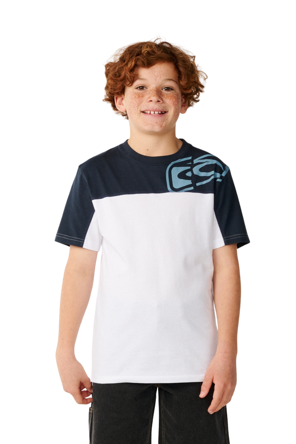 A young boy with curly red hair wearing a color-blocked short-sleeve t-shirt. The shirt features a navy blue upper section and sleeves, a white lower body, and a light blue graphic logo on the right chest.